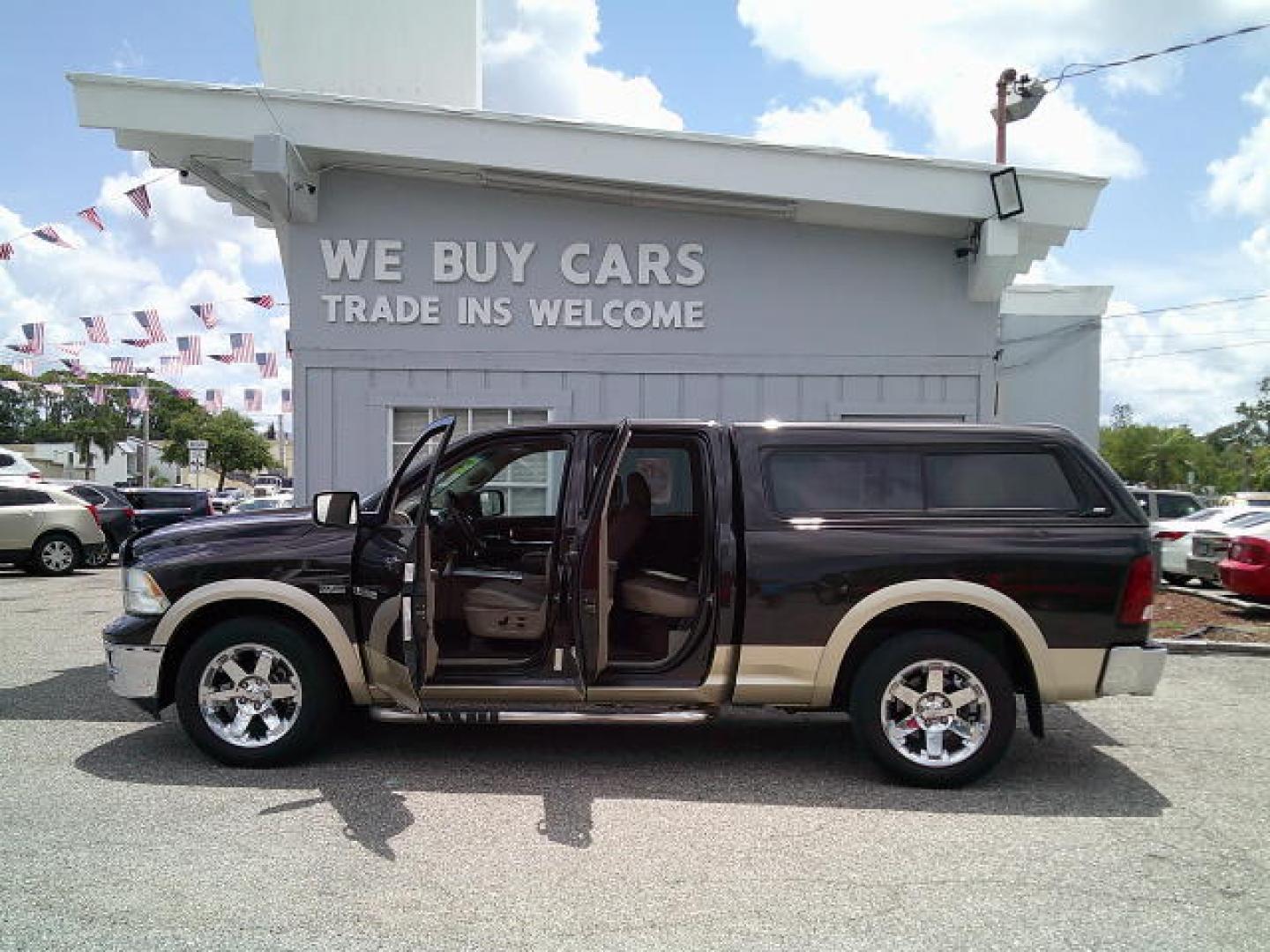 2011 /195482 Dodge Ram 1500 Sport Quad Cab 4WD (1D7RV1GT2BS) with an 5.7L V8 OHV 16V engine, 5-Speed Automatic transmission, located at 4000 Bee Ridge Road, Sarasota, FL, 34233, (941) 926-0300, 27.298664, -82.489151- Photo#4