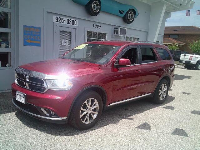 2015 Red /Black Dodge Durango Limited 2WD (1C4RDHDG9FC) with an 3.6L V6 DOHC 24V engine, 8A transmission, located at 4000 Bee Ridge Road, Sarasota, FL, 34233, (941) 926-0300, 27.298664, -82.489151- Photo#1