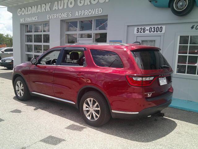 2015 Red /Black Dodge Durango Limited 2WD (1C4RDHDG9FC) with an 3.6L V6 DOHC 24V engine, 8A transmission, located at 4000 Bee Ridge Road, Sarasota, FL, 34233, (941) 926-0300, 27.298664, -82.489151- Photo#3
