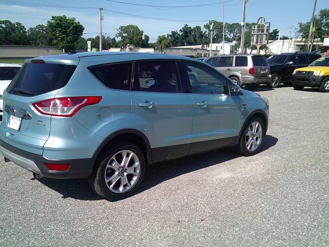 2013 Green /Black Ford Escape SEL FWD (1FMCU0HX4DU) with an 1.6L L4 DOHC 16V engine, 6A transmission, located at 4000 Bee Ridge Road, Sarasota, FL, 34233, (941) 926-0300, 27.298664, -82.489151- Photo#6