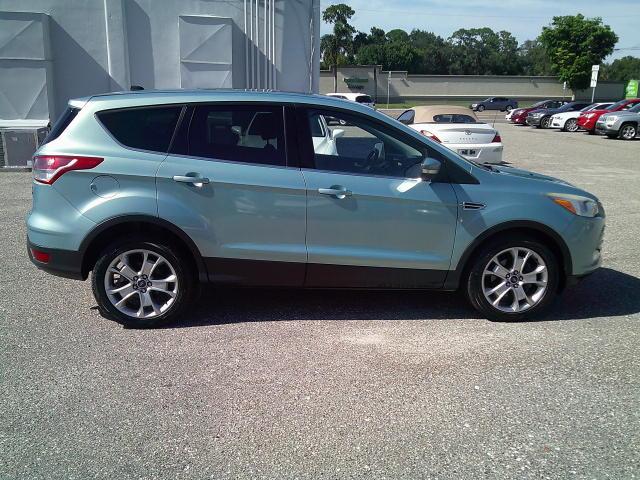 2013 Green /Black Ford Escape SEL FWD (1FMCU0HX4DU) with an 1.6L L4 DOHC 16V engine, 6A transmission, located at 4000 Bee Ridge Road, Sarasota, FL, 34233, (941) 926-0300, 27.298664, -82.489151- Photo#7