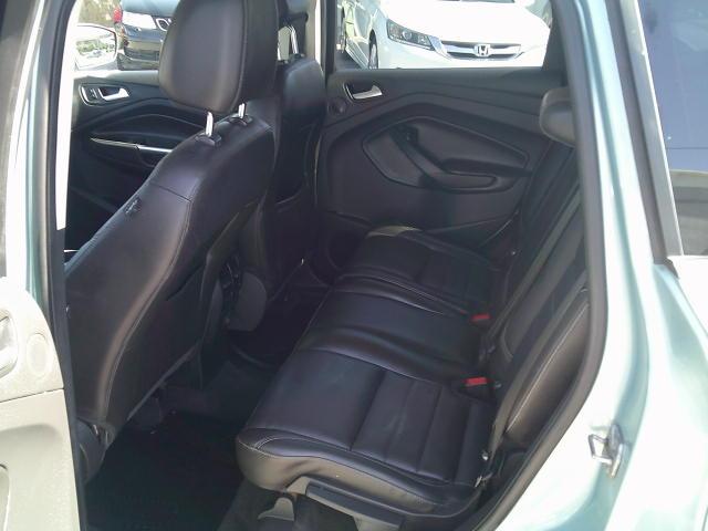 2013 Green /Black Ford Escape SEL FWD (1FMCU0HX4DU) with an 1.6L L4 DOHC 16V engine, 6A transmission, located at 4000 Bee Ridge Road, Sarasota, FL, 34233, (941) 926-0300, 27.298664, -82.489151- Photo#11
