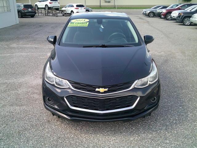 2018 Black /Black Chevrolet Cruze LS Auto (1G1BC5SM5J7) with an 1.4L L4 DOHC 16V TURBO engine, 6A transmission, located at 4000 Bee Ridge Road, Sarasota, FL, 34233, (941) 926-0300, 27.298664, -82.489151- Photo#2