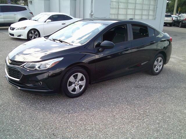 2018 Black /Black Chevrolet Cruze LS Auto (1G1BC5SM5J7) with an 1.4L L4 DOHC 16V TURBO engine, 6A transmission, located at 4000 Bee Ridge Road, Sarasota, FL, 34233, (941) 926-0300, 27.298664, -82.489151- Photo#1