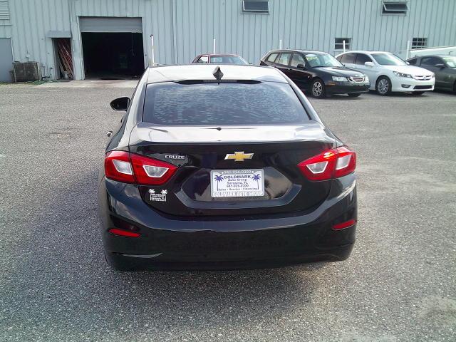 2018 Black /Black Chevrolet Cruze LS Auto (1G1BC5SM5J7) with an 1.4L L4 DOHC 16V TURBO engine, 6A transmission, located at 4000 Bee Ridge Road, Sarasota, FL, 34233, (941) 926-0300, 27.298664, -82.489151- Photo#5