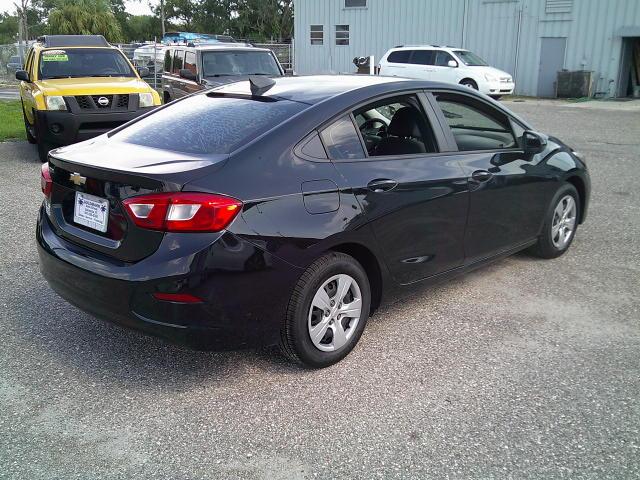 2018 Black /Black Chevrolet Cruze LS Auto (1G1BC5SM5J7) with an 1.4L L4 DOHC 16V TURBO engine, 6A transmission, located at 4000 Bee Ridge Road, Sarasota, FL, 34233, (941) 926-0300, 27.298664, -82.489151- Photo#6