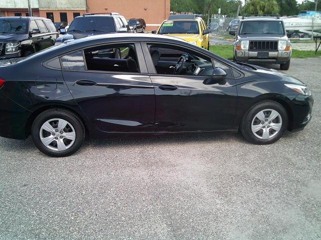 2018 Black /Black Chevrolet Cruze LS Auto (1G1BC5SM5J7) with an 1.4L L4 DOHC 16V TURBO engine, 6A transmission, located at 4000 Bee Ridge Road, Sarasota, FL, 34233, (941) 926-0300, 27.298664, -82.489151- Photo#7
