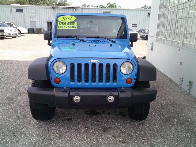 2011 Blue /Grey Jeep Wrangler Unlimited Sport 4WD (1J4HA3H10BL) with an 3.8L V6 OHV 12V engine, Automatic transmission, located at 4000 Bee Ridge Road, Sarasota, FL, 34233, (941) 926-0300, 27.298664, -82.489151- Photo#2