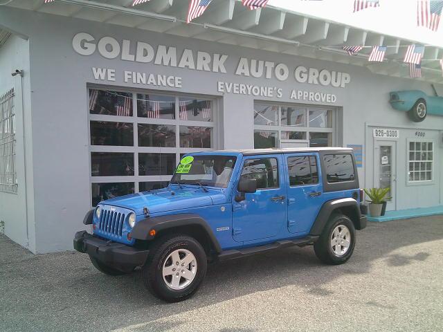 2011 Blue /Grey Jeep Wrangler Unlimited Sport 4WD (1J4HA3H10BL) with an 3.8L V6 OHV 12V engine, Automatic transmission, located at 4000 Bee Ridge Road, Sarasota, FL, 34233, (941) 926-0300, 27.298664, -82.489151- Photo#8