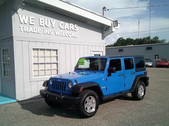 2011 Blue /Grey Jeep Wrangler Unlimited Sport 4WD (1J4HA3H10BL) with an 3.8L V6 OHV 12V engine, Automatic transmission, located at 4000 Bee Ridge Road, Sarasota, FL, 34233, (941) 926-0300, 27.298664, -82.489151- Photo#7