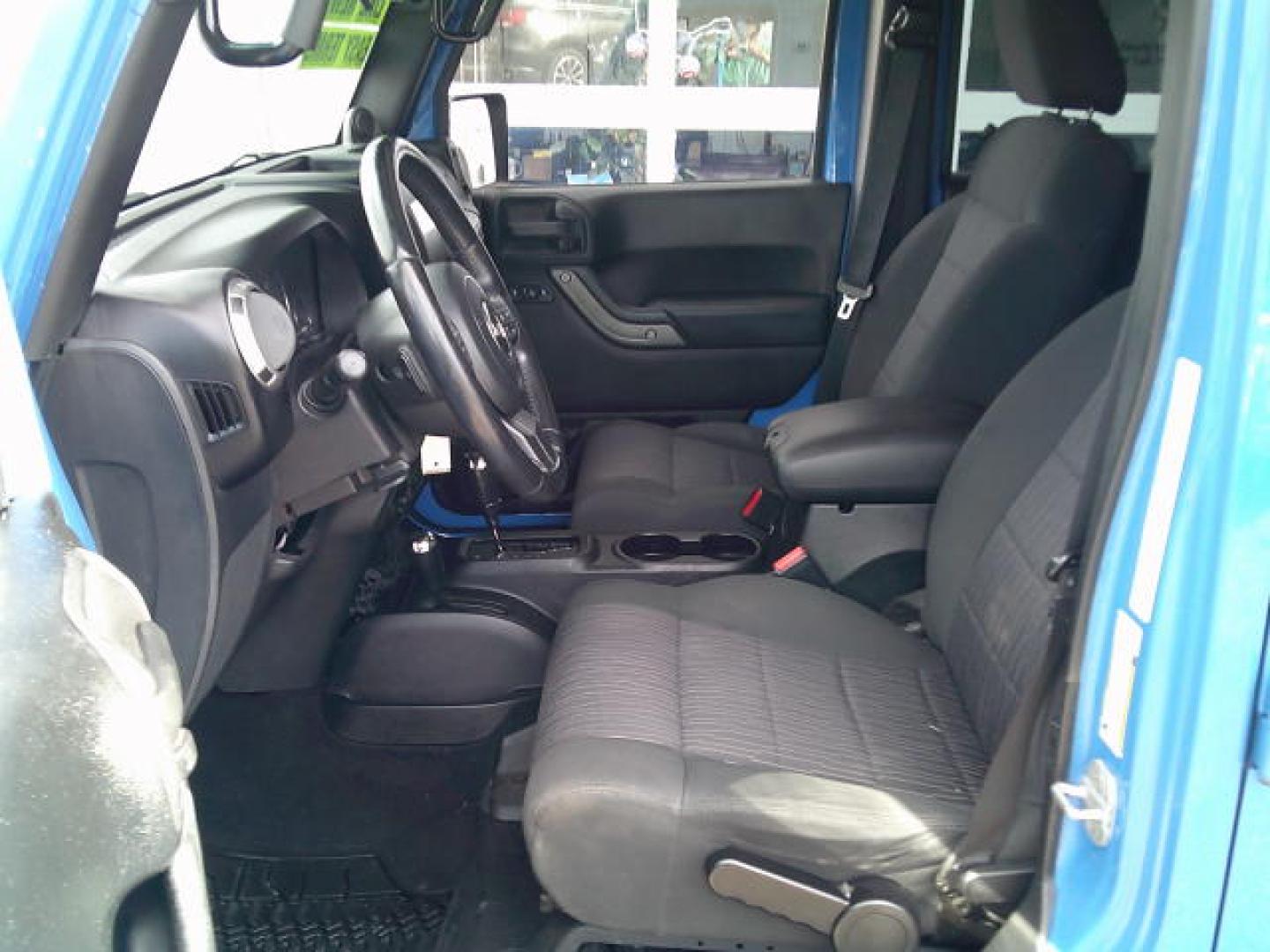 2011 Blue /Grey Jeep Wrangler Unlimited Sport 4WD (1J4HA3H10BL) with an 3.8L V6 OHV 12V engine, Automatic transmission, located at 4000 Bee Ridge Road, Sarasota, FL, 34233, (941) 926-0300, 27.298664, -82.489151- Photo#9