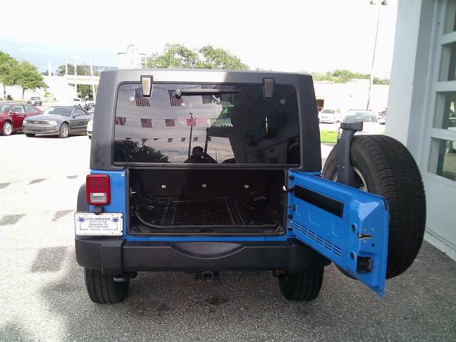 2011 Blue /Grey Jeep Wrangler Unlimited Sport 4WD (1J4HA3H10BL) with an 3.8L V6 OHV 12V engine, Automatic transmission, located at 4000 Bee Ridge Road, Sarasota, FL, 34233, (941) 926-0300, 27.298664, -82.489151- Photo#6