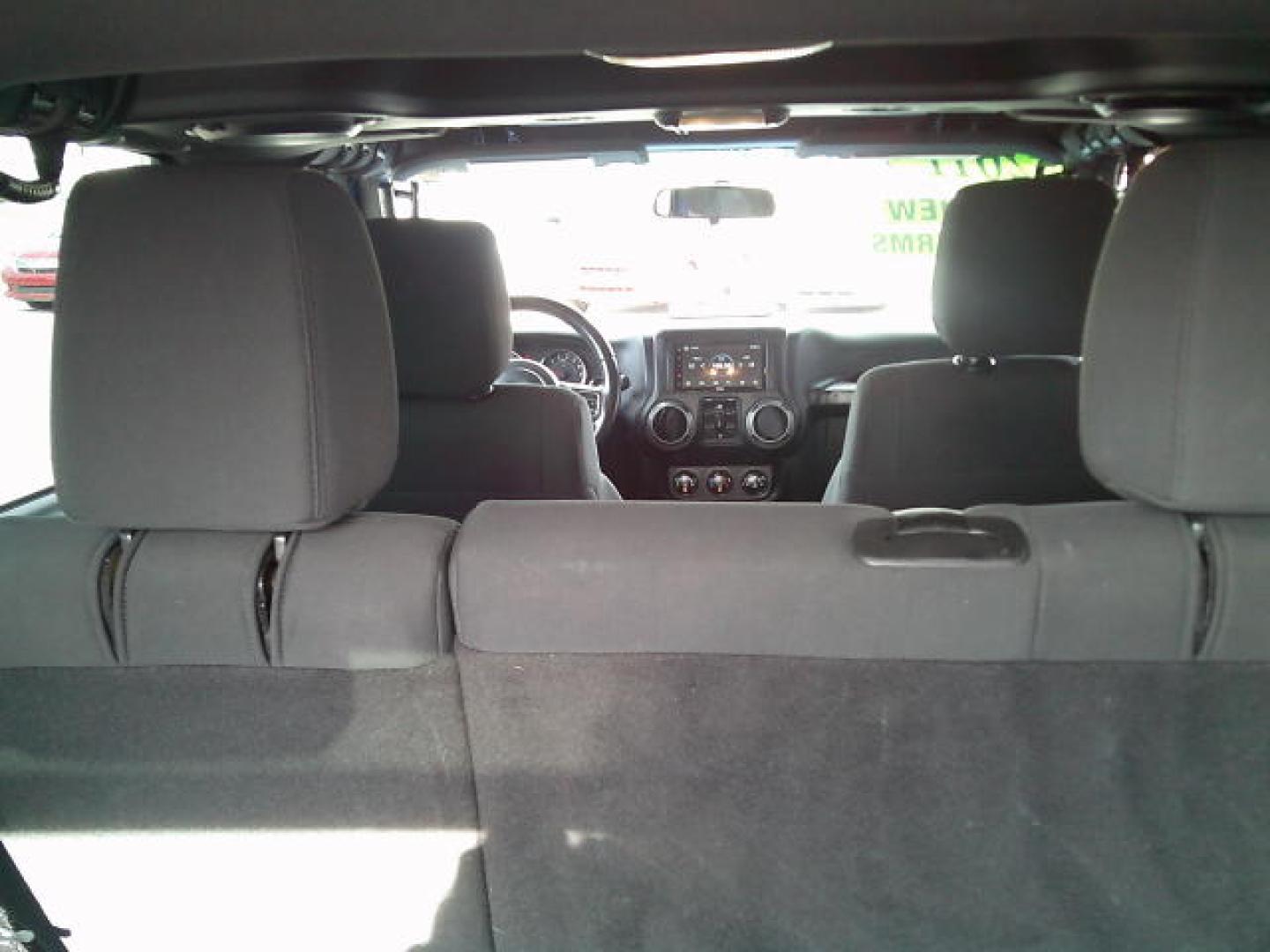 2011 Blue /Grey Jeep Wrangler Unlimited Sport 4WD (1J4HA3H10BL) with an 3.8L V6 OHV 12V engine, Automatic transmission, located at 4000 Bee Ridge Road, Sarasota, FL, 34233, (941) 926-0300, 27.298664, -82.489151- Photo#14