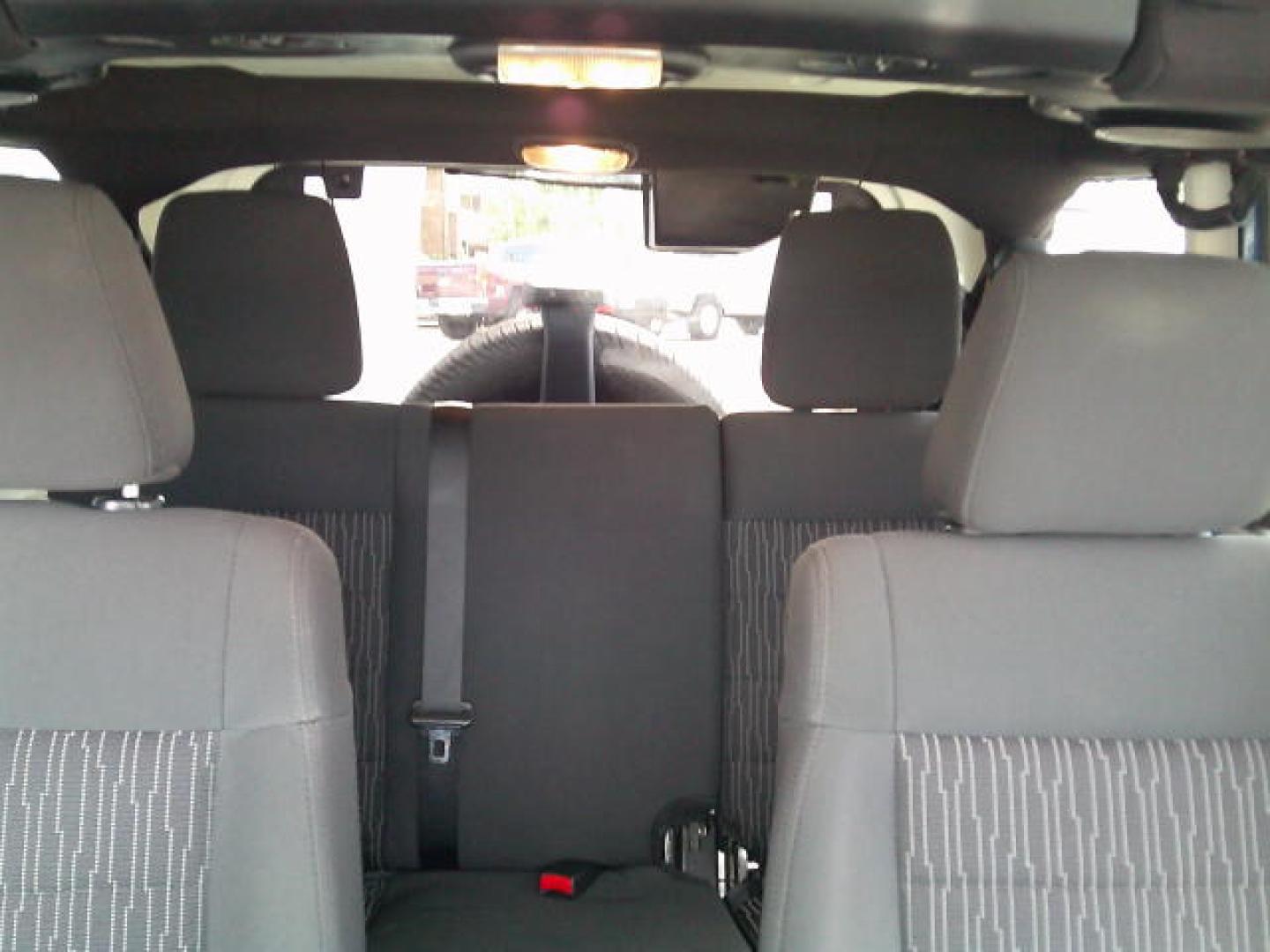 2011 Blue /Grey Jeep Wrangler Unlimited Sport 4WD (1J4HA3H10BL) with an 3.8L V6 OHV 12V engine, Automatic transmission, located at 4000 Bee Ridge Road, Sarasota, FL, 34233, (941) 926-0300, 27.298664, -82.489151- Photo#15