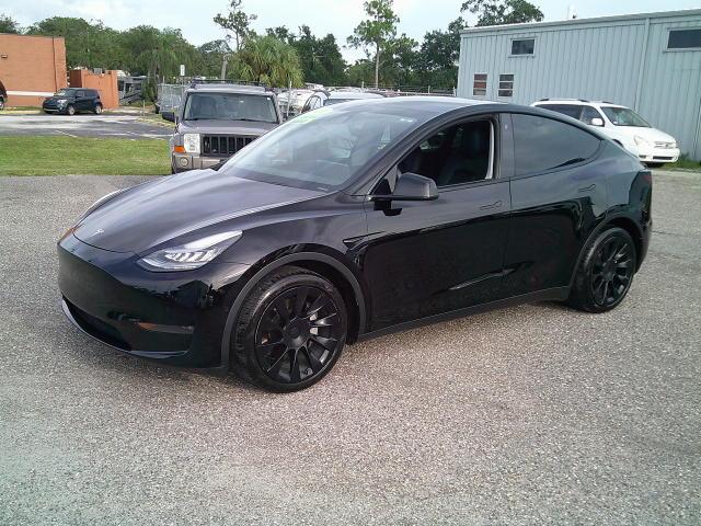 2020 Black /Black Tesla Model Y Long Range (5YJYGDEE5LF) with an ELECTRIC engine, 1A transmission, located at 4000 Bee Ridge Road, Sarasota, FL, 34233, (941) 926-0300, 27.298664, -82.489151- Photo#1