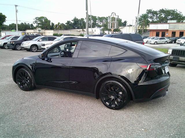 2020 Black /Black Tesla Model Y Long Range (5YJYGDEE5LF) with an ELECTRIC engine, 1A transmission, located at 4000 Bee Ridge Road, Sarasota, FL, 34233, (941) 926-0300, 27.298664, -82.489151- Photo#4