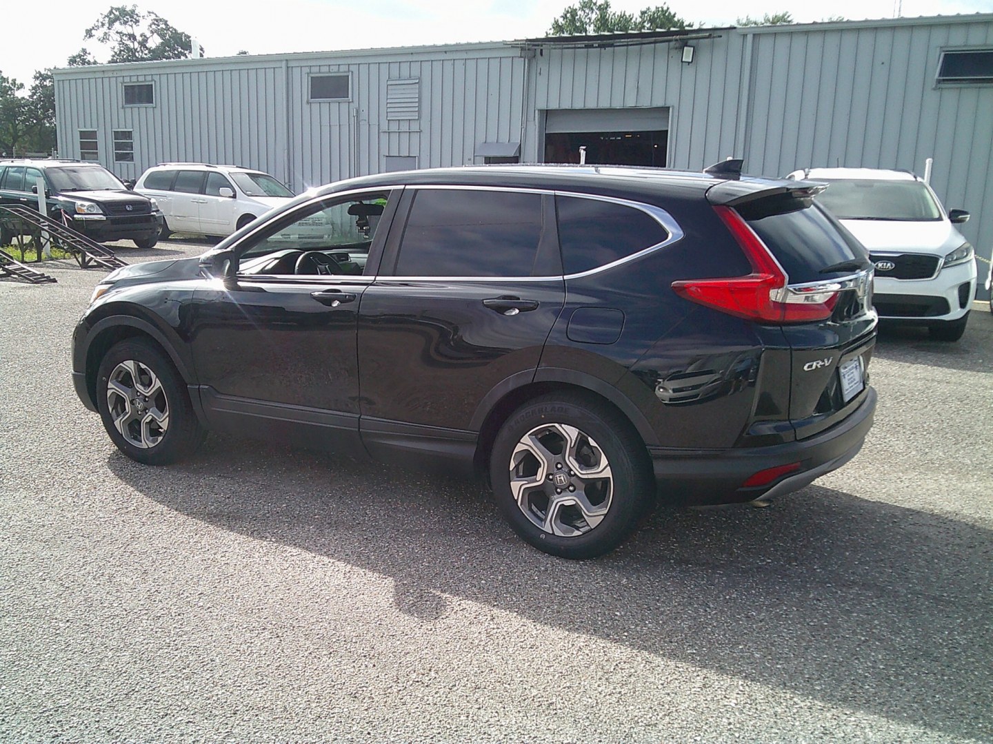 2019 Black /Black Honda CR-V EX AWD (7FARW2H51KE) with an 1.5L L4 16V DOHC TURBO engine, CVT transmission, located at 4000 Bee Ridge Road, Sarasota, FL, 34233, (941) 926-0300, 27.298664, -82.489151- Photo#4
