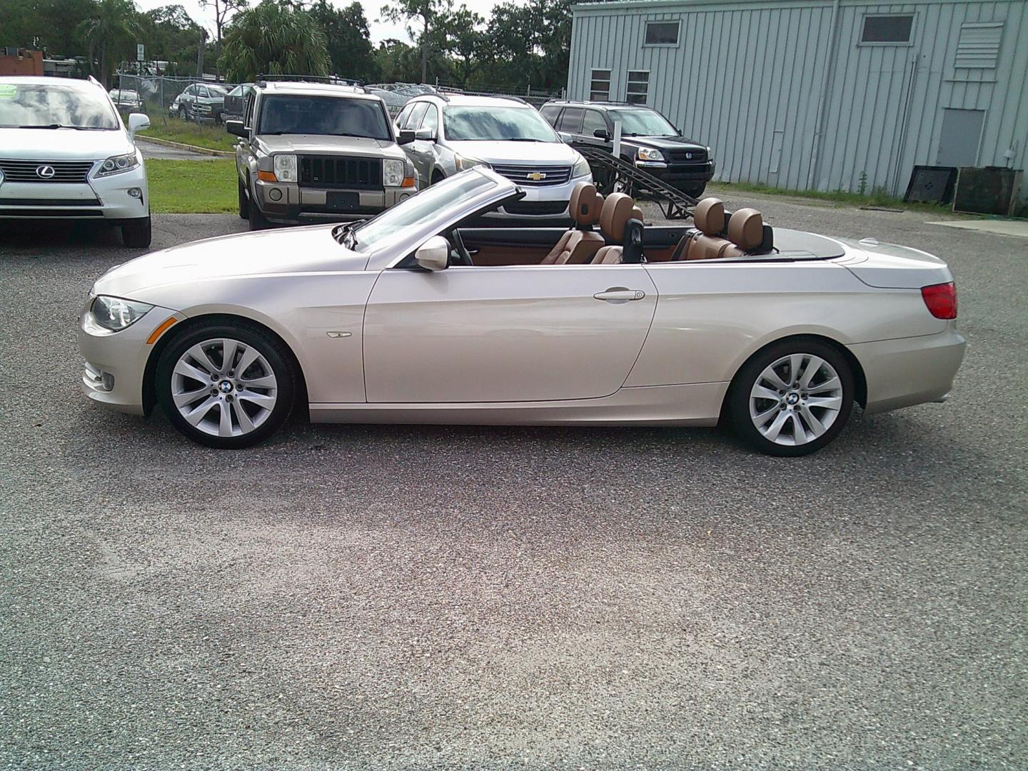 2013 Gold /Brown BMW 3-Series 328i Convertible (WBADW7C52DE) with an 3.0L L6 DOHC 24V engine, Automatic transmission, located at 4000 Bee Ridge Road, Sarasota, FL, 34233, (941) 926-0300, 27.298664, -82.489151- Photo#3