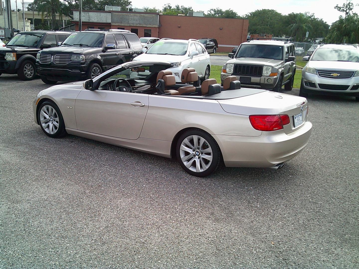 2013 Gold /Brown BMW 3-Series 328i Convertible (WBADW7C52DE) with an 3.0L L6 DOHC 24V engine, Automatic transmission, located at 4000 Bee Ridge Road, Sarasota, FL, 34233, (941) 926-0300, 27.298664, -82.489151- Photo#4
