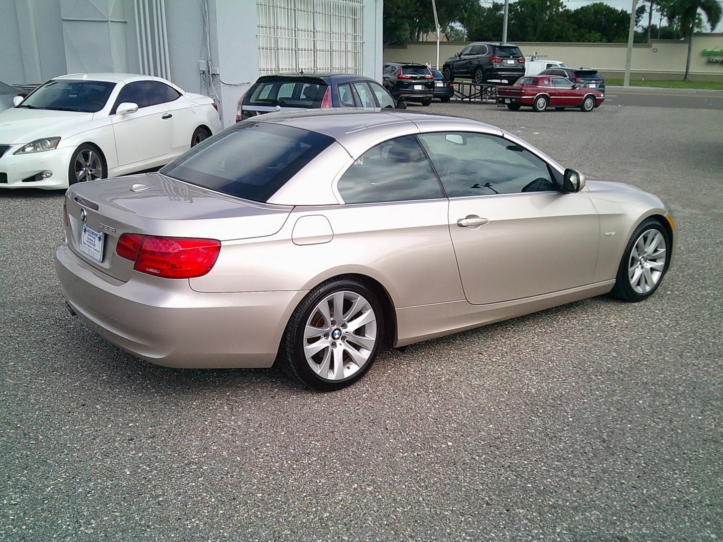 2013 Gold /Brown BMW 3-Series 328i Convertible (WBADW7C52DE) with an 3.0L L6 DOHC 24V engine, Automatic transmission, located at 4000 Bee Ridge Road, Sarasota, FL, 34233, (941) 926-0300, 27.298664, -82.489151- Photo#6