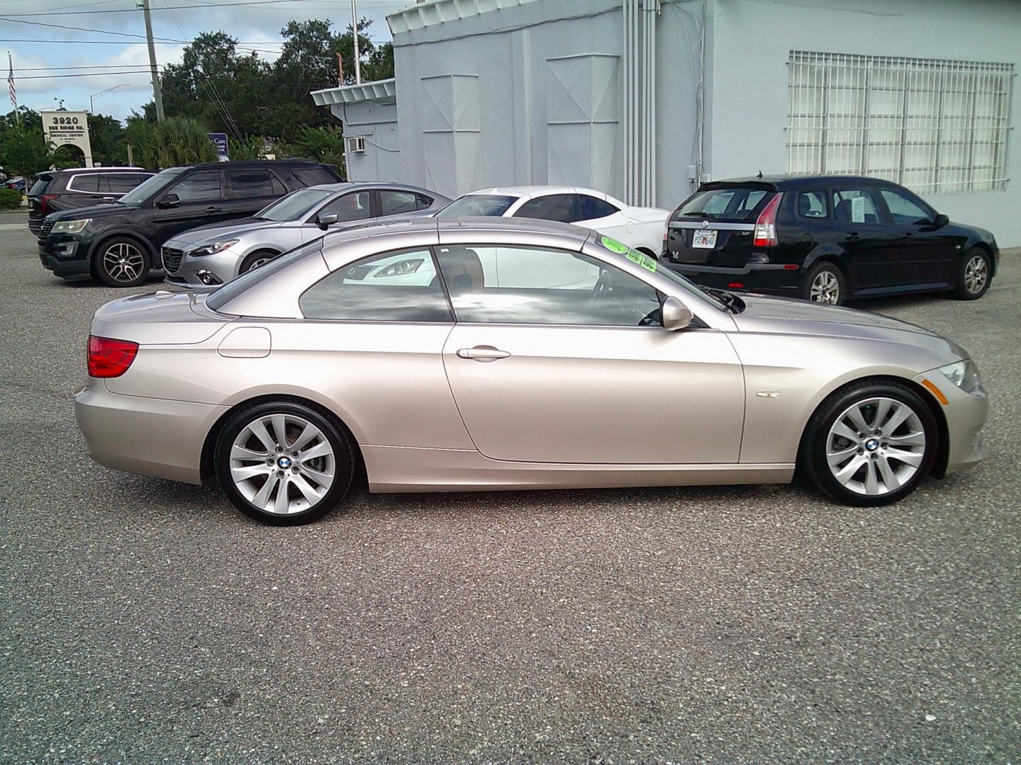 2013 Gold /Brown BMW 3-Series 328i Convertible (WBADW7C52DE) with an 3.0L L6 DOHC 24V engine, Automatic transmission, located at 4000 Bee Ridge Road, Sarasota, FL, 34233, (941) 926-0300, 27.298664, -82.489151- Photo#7
