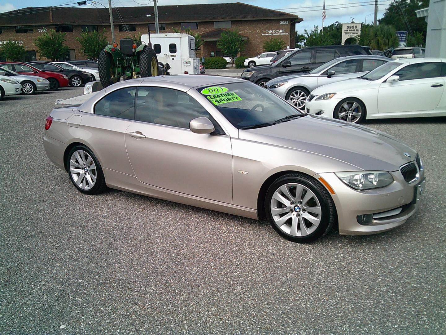 2013 Gold /Brown BMW 3-Series 328i Convertible (WBADW7C52DE) with an 3.0L L6 DOHC 24V engine, Automatic transmission, located at 4000 Bee Ridge Road, Sarasota, FL, 34233, (941) 926-0300, 27.298664, -82.489151- Photo#8
