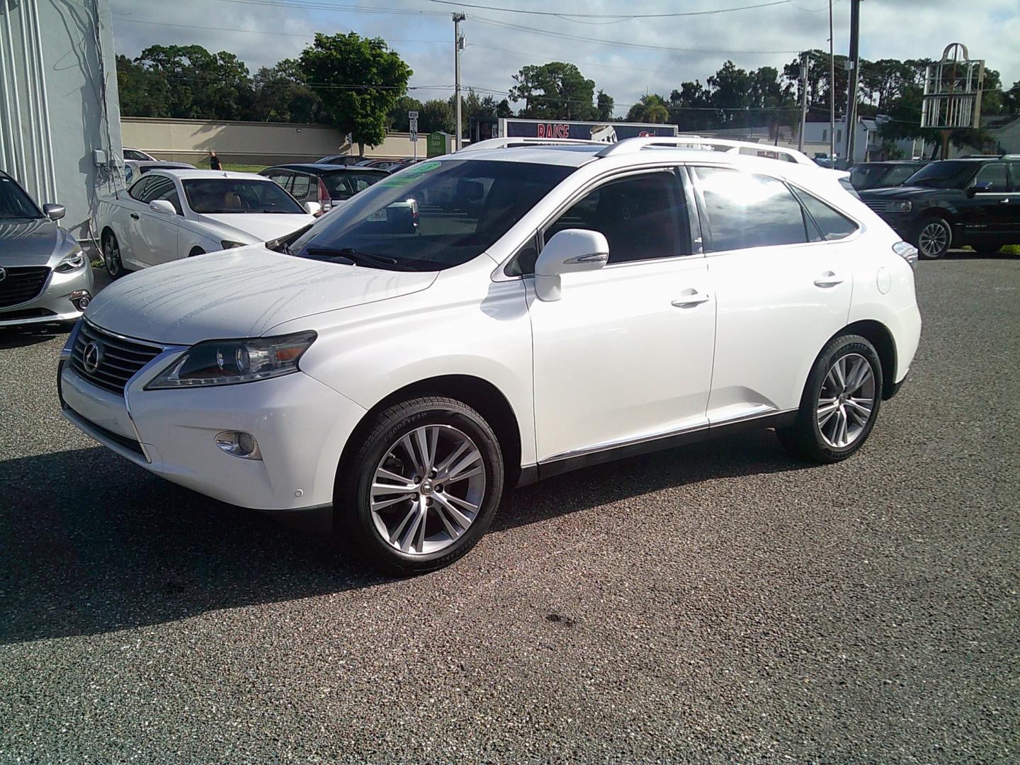 2015 White /Brown Lexus RX 350 FWD (2T2ZK1BA9FC) with an 3.5L V6 DOHC 24V engine, 6-Speed Automatic transmission, located at 4000 Bee Ridge Road, Sarasota, FL, 34233, (941) 926-0300, 27.298664, -82.489151- Photo#1
