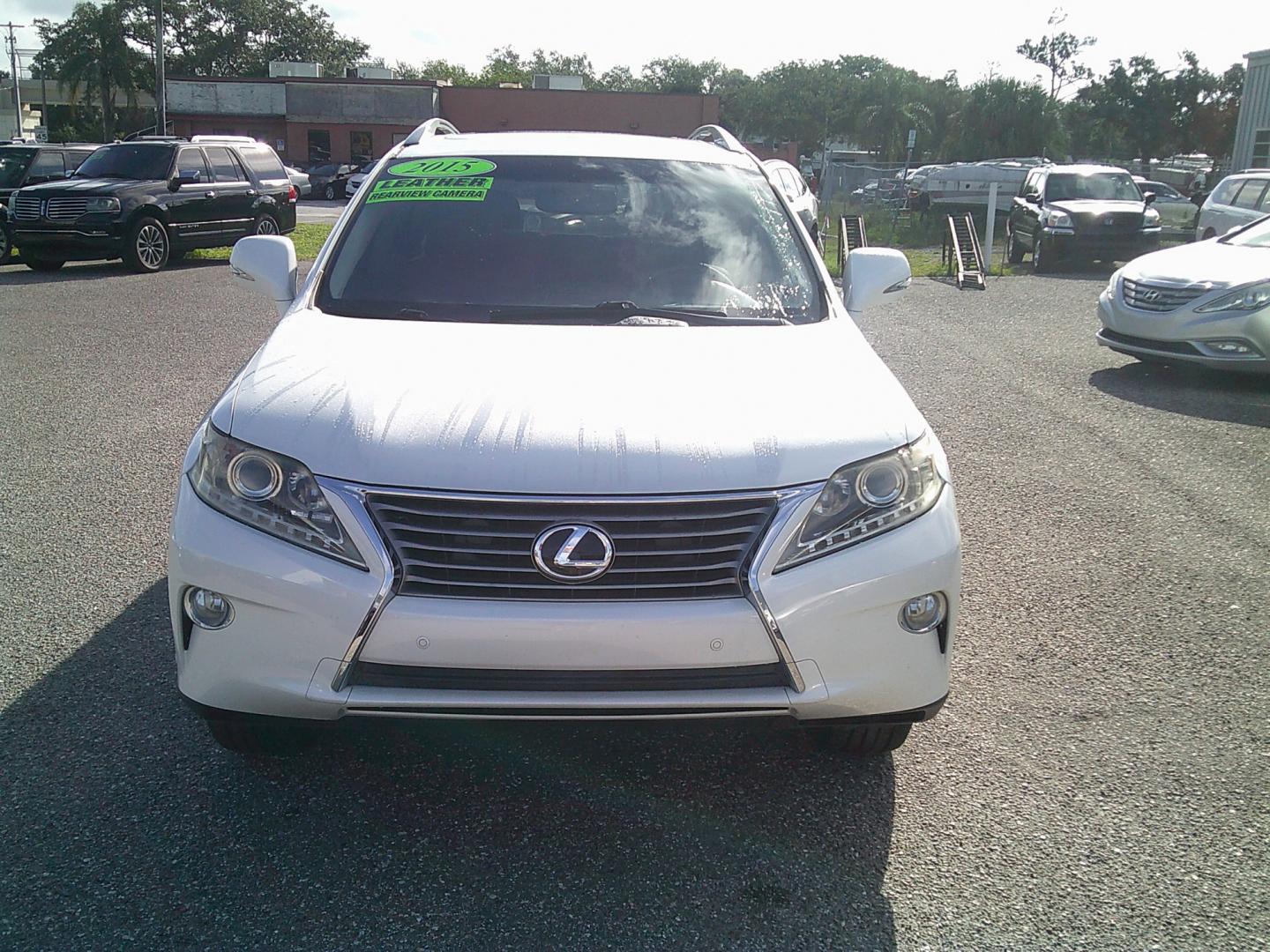 2015 White /Brown Lexus RX 350 FWD (2T2ZK1BA9FC) with an 3.5L V6 DOHC 24V engine, 6-Speed Automatic transmission, located at 4000 Bee Ridge Road, Sarasota, FL, 34233, (941) 926-0300, 27.298664, -82.489151- Photo#2