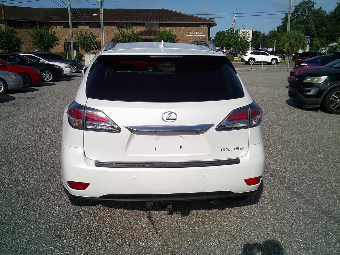 2015 White /Brown Lexus RX 350 FWD (2T2ZK1BA9FC) with an 3.5L V6 DOHC 24V engine, 6-Speed Automatic transmission, located at 4000 Bee Ridge Road, Sarasota, FL, 34233, (941) 926-0300, 27.298664, -82.489151- Photo#5