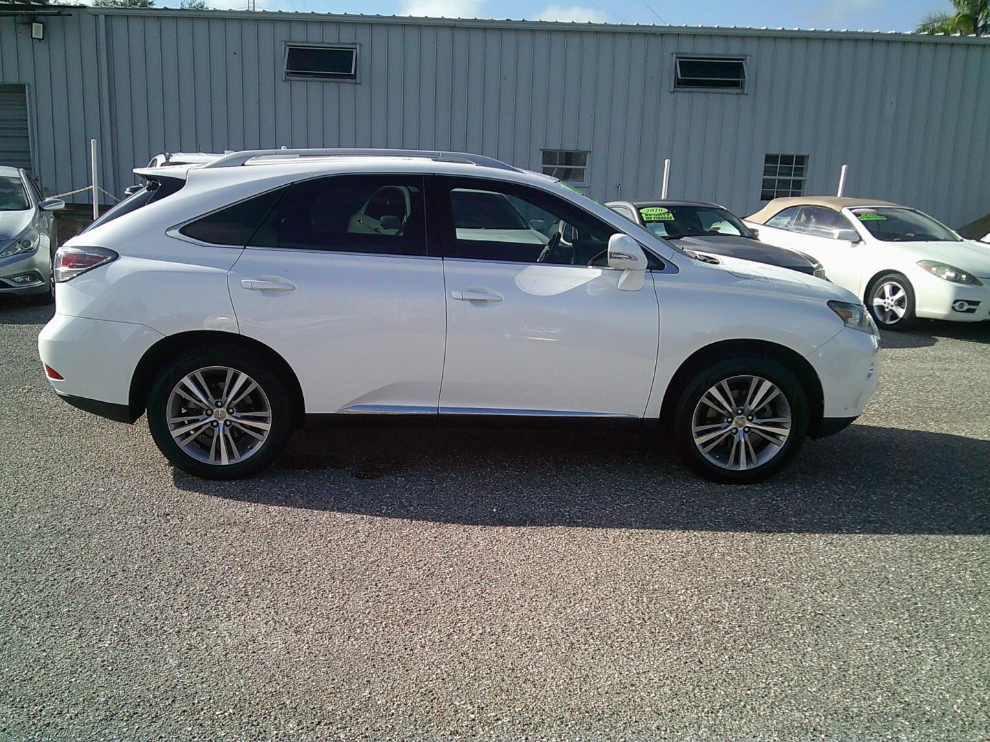 2015 White /Brown Lexus RX 350 FWD (2T2ZK1BA9FC) with an 3.5L V6 DOHC 24V engine, 6-Speed Automatic transmission, located at 4000 Bee Ridge Road, Sarasota, FL, 34233, (941) 926-0300, 27.298664, -82.489151- Photo#7