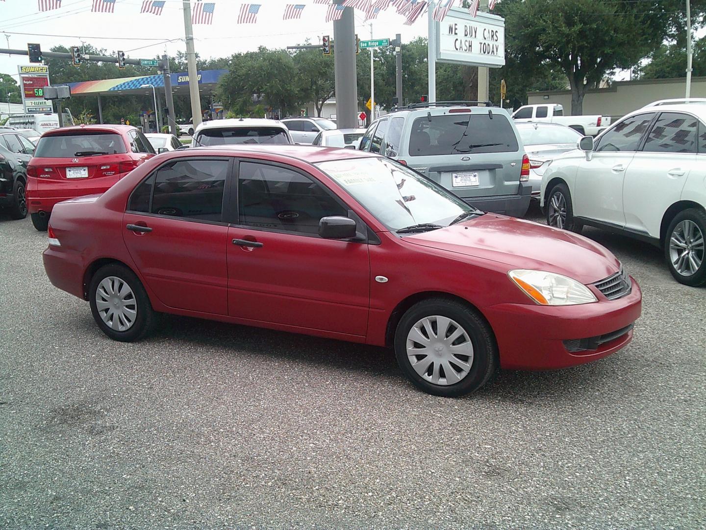 2006 Red /Gray Mitsubishi Lancer ES (JA3AJ26E36U) with an 2.0L L4 SOHC 16V engine, Automatic transmission, located at 4000 Bee Ridge Road, Sarasota, FL, 34233, (941) 926-0300, 27.298664, -82.489151- Photo#1