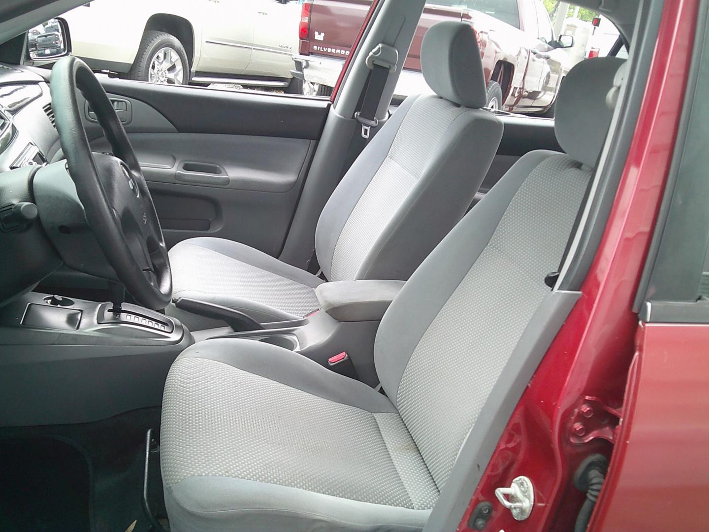 2006 Red /Gray Mitsubishi Lancer ES (JA3AJ26E36U) with an 2.0L L4 SOHC 16V engine, Automatic transmission, located at 4000 Bee Ridge Road, Sarasota, FL, 34233, (941) 926-0300, 27.298664, -82.489151- Photo#7
