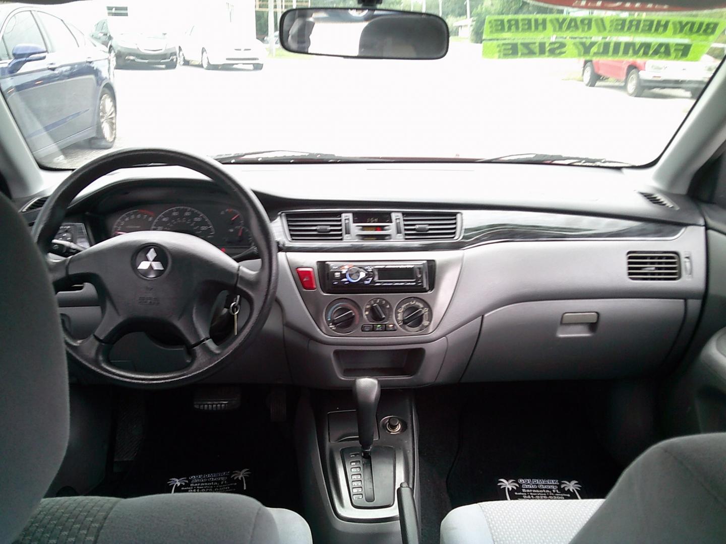 2006 Red /Gray Mitsubishi Lancer ES (JA3AJ26E36U) with an 2.0L L4 SOHC 16V engine, Automatic transmission, located at 4000 Bee Ridge Road, Sarasota, FL, 34233, (941) 926-0300, 27.298664, -82.489151- Photo#9