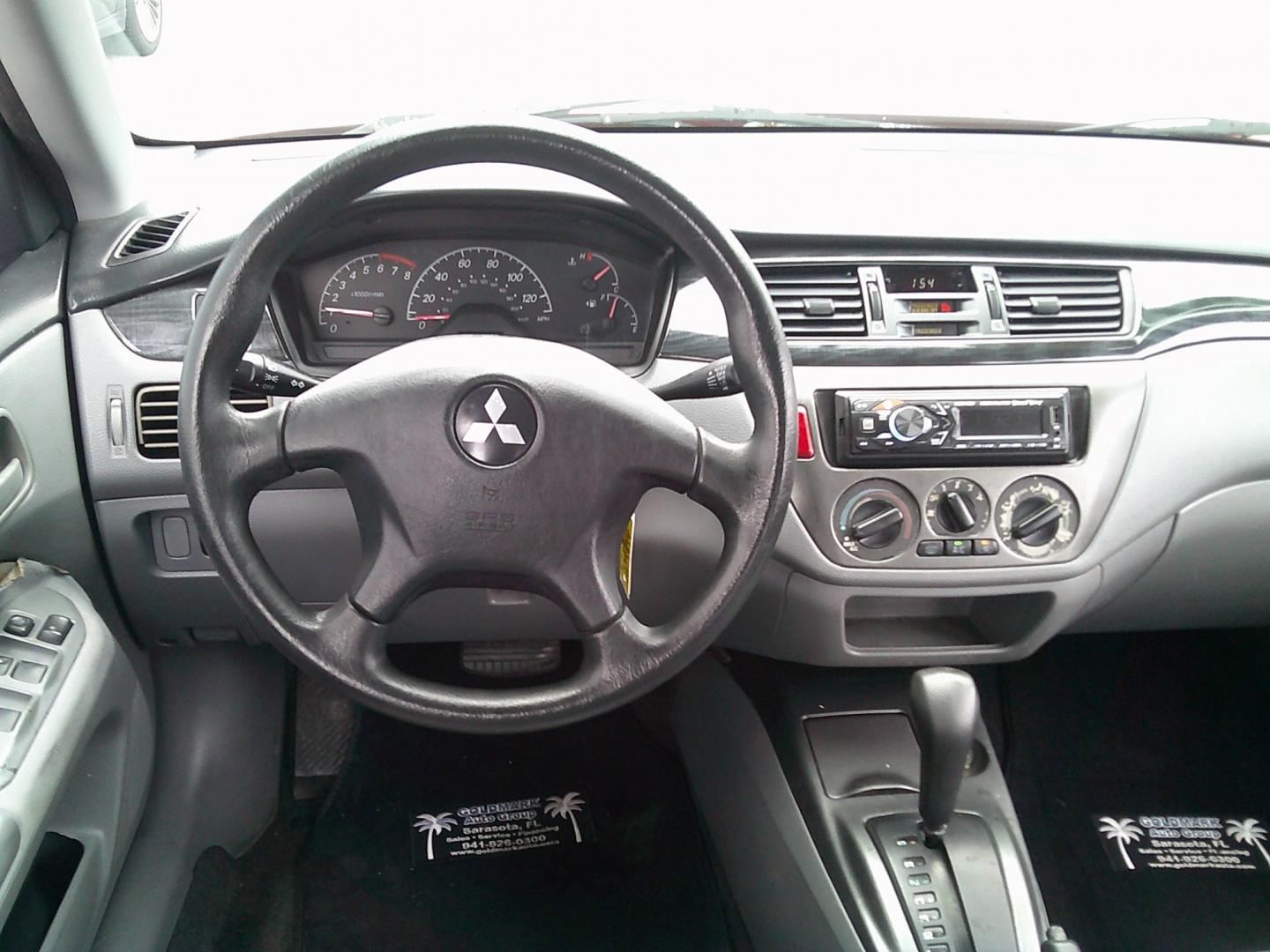 2006 Red /Gray Mitsubishi Lancer ES (JA3AJ26E36U) with an 2.0L L4 SOHC 16V engine, Automatic transmission, located at 4000 Bee Ridge Road, Sarasota, FL, 34233, (941) 926-0300, 27.298664, -82.489151- Photo#10
