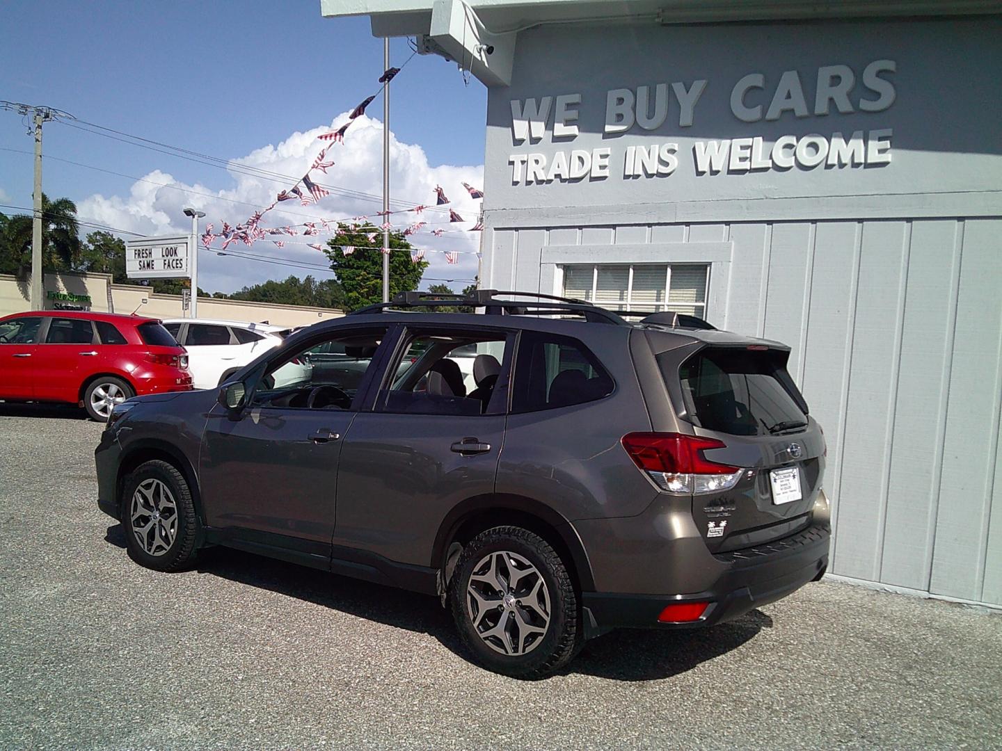 2019 Brown /Beige Subaru Forester Premium (JF2SKAGC4KH) with an 2.5L H4 SOHC 16V engine, CVT transmission, located at 4000 Bee Ridge Road, Sarasota, FL, 34233, (941) 926-0300, 27.298664, -82.489151- Photo#3
